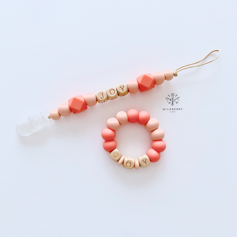 Wildberry Word Teether Strap- Coral